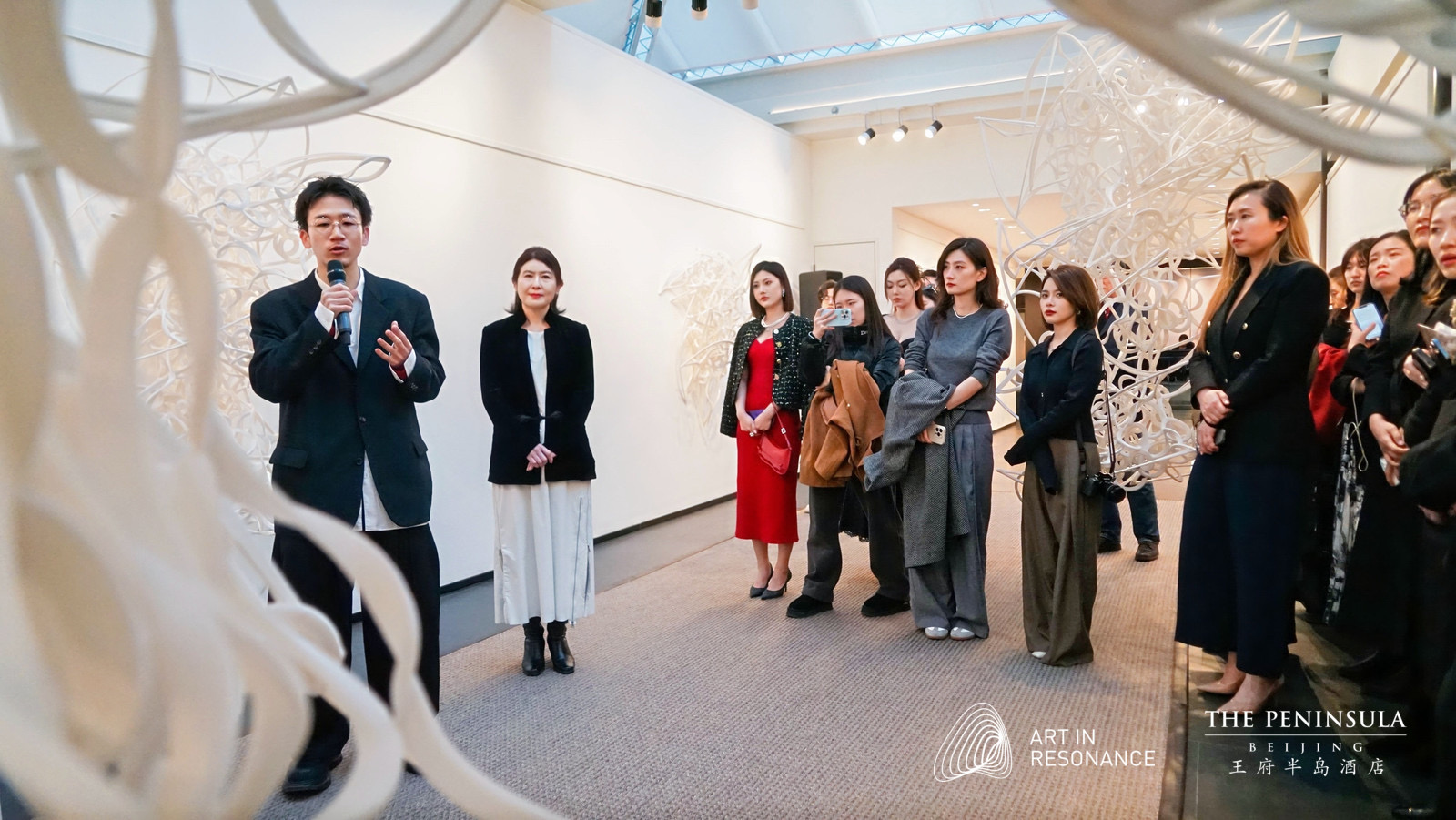 Ryunosuke Okazaki speaking about his work at the opening at The Peninsula Beijing
